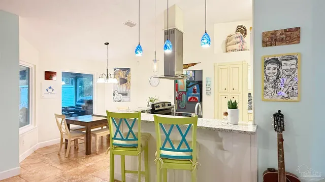 a bedroom with a bed furniture and a flat screen tv