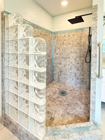 a bedroom with furniture and a bed