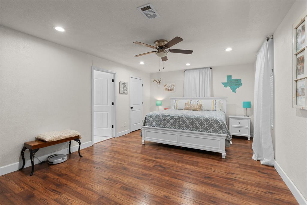 605 South 3rd Street Grandview, TX 76050 - Photo 12 of 23 Bedroom with dark wood-style flooring, a ceiling fan, and recessed lighting