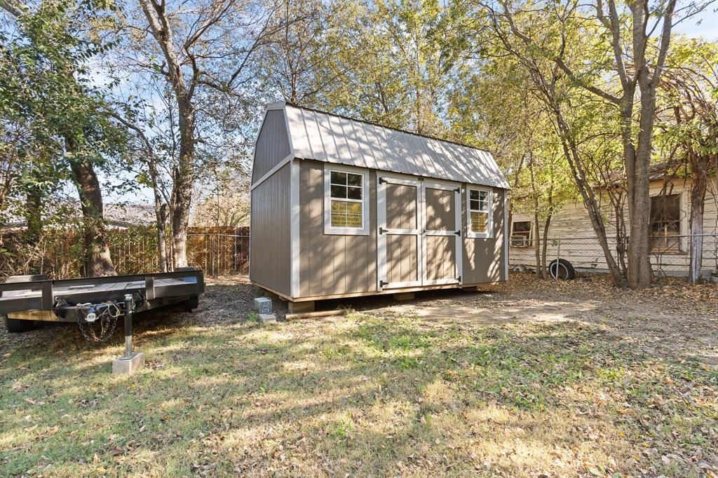 605 South 3rd Street Grandview, TX 76050 - Photo 19 of 23 View of shed featuring a fenced backyard