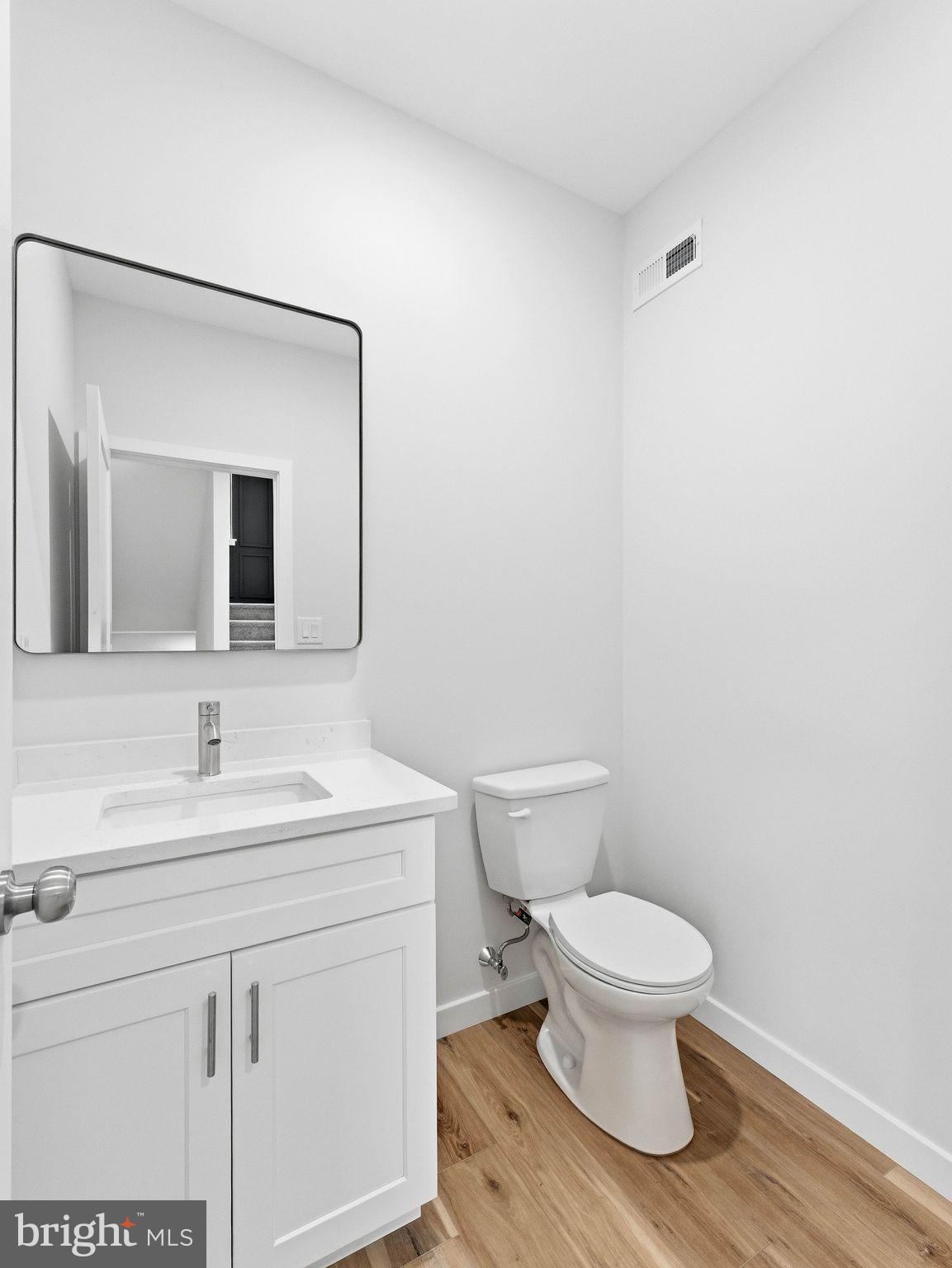 1327 Filbert Street Glassboro, NJ 08028 - Photo 11 of 47 Sleek and modern half-bath retreat.
