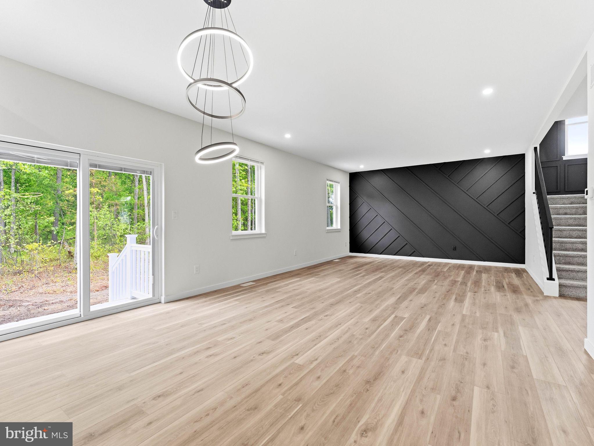 1327 Filbert Street Glassboro, NJ 08028 - Photo 15 of 47 Spacious modern living area with nature views.
