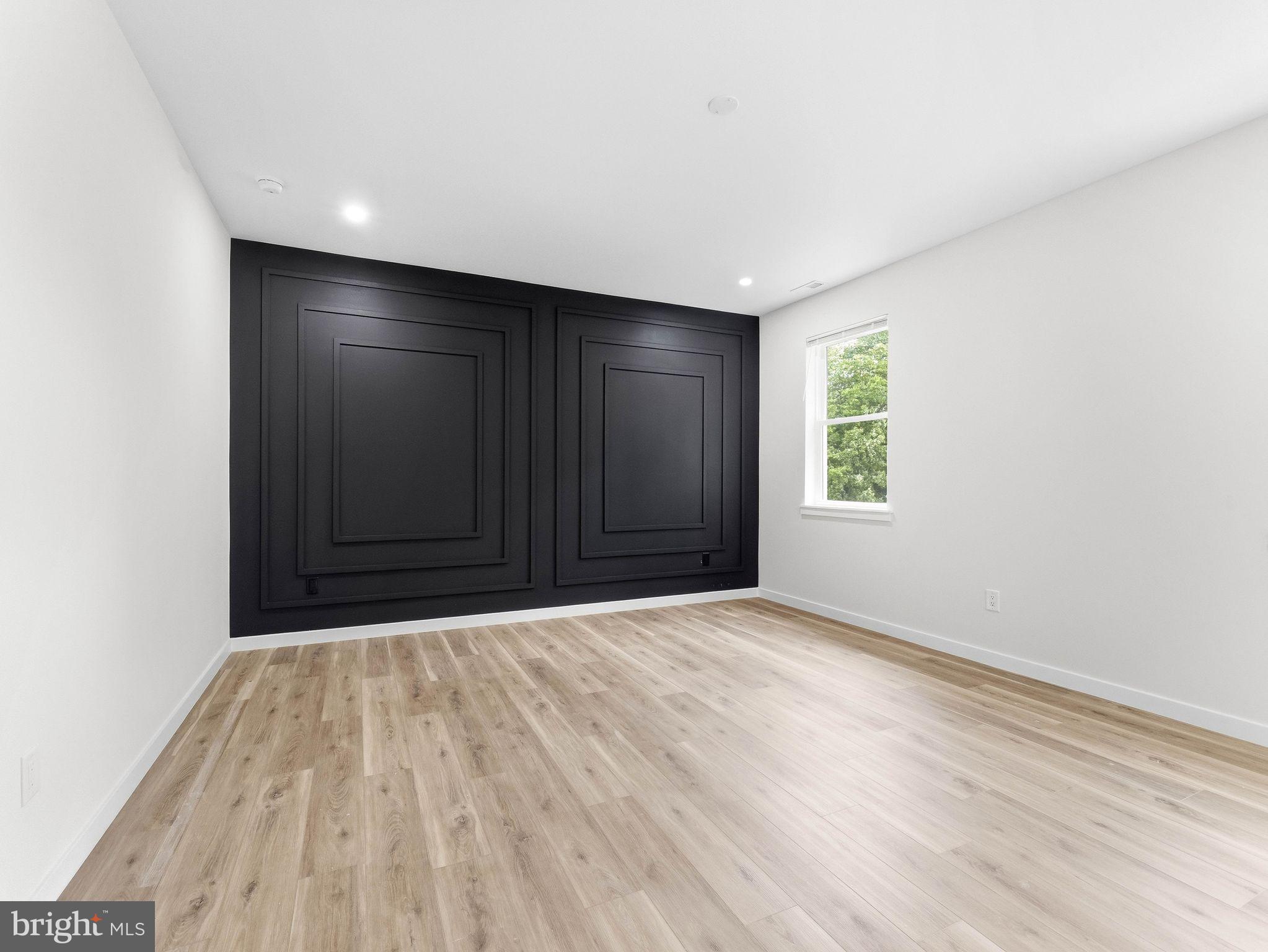1327 Filbert Street Glassboro, NJ 08028 - Photo 28 of 47 Sleek space with bold accent wall.