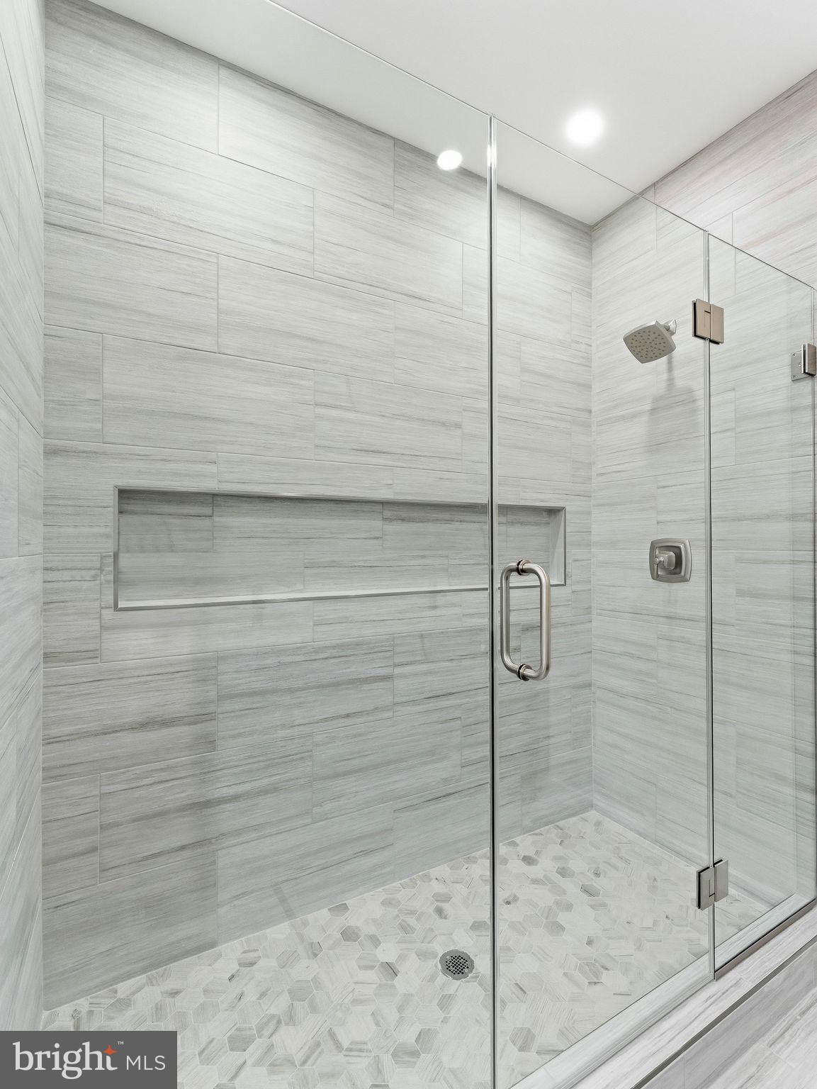 1327 Filbert Street Glassboro, NJ 08028 - Photo 31 of 47 Sleek modern shower with elegant tiles.