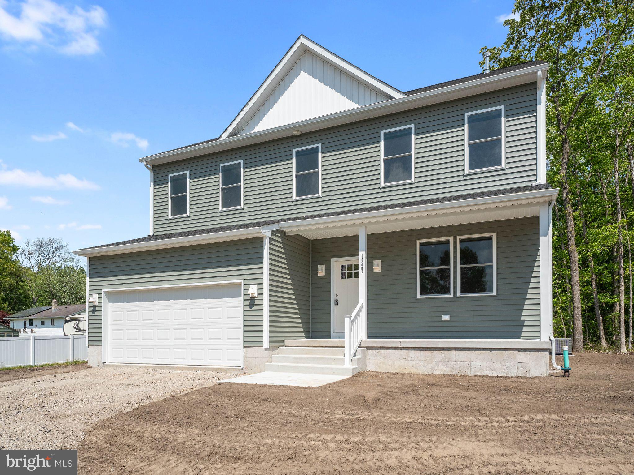 1327 Filbert Street Glassboro, NJ 08028 - Photo 5 of 47 Modern home nestled in nature's embrace.