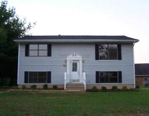 a front view of house with yard
