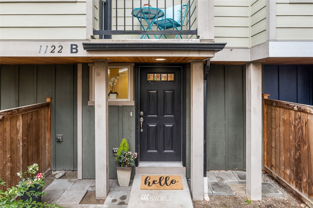 1122 North 92nd Street, Unit B Seattle, WA 98103 - Photo 1 of 32 a view of a entryway door of the building