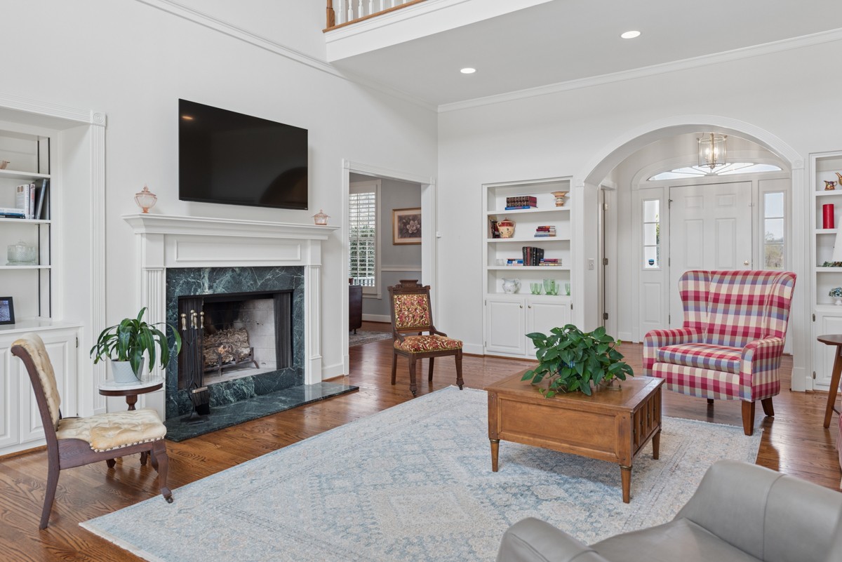 255 Lindsey Hollow Road Gallatin, TN 37066 - Photo 12 of 40 a living room with furniture fireplace and flat screen tv