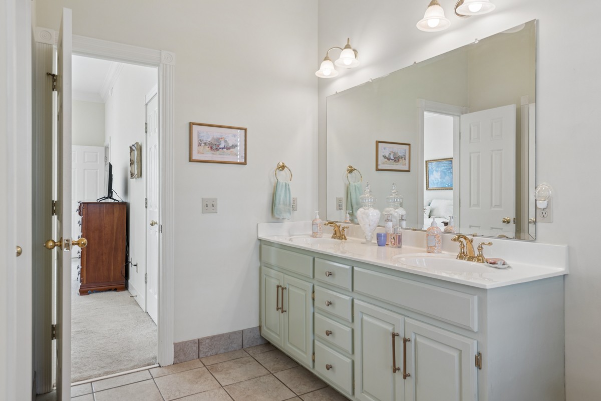 255 Lindsey Hollow Road Gallatin, TN 37066 - Photo 23 of 40 a spacious bathroom with a double vanity sink mirror and