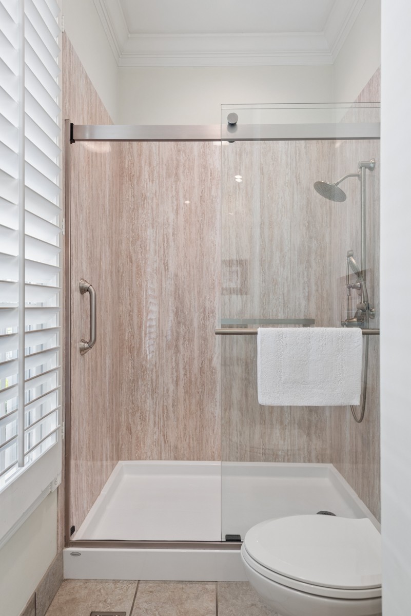255 Lindsey Hollow Road Gallatin, TN 37066 - Photo 24 of 40 a bathroom with a shower curtain and a bathtub