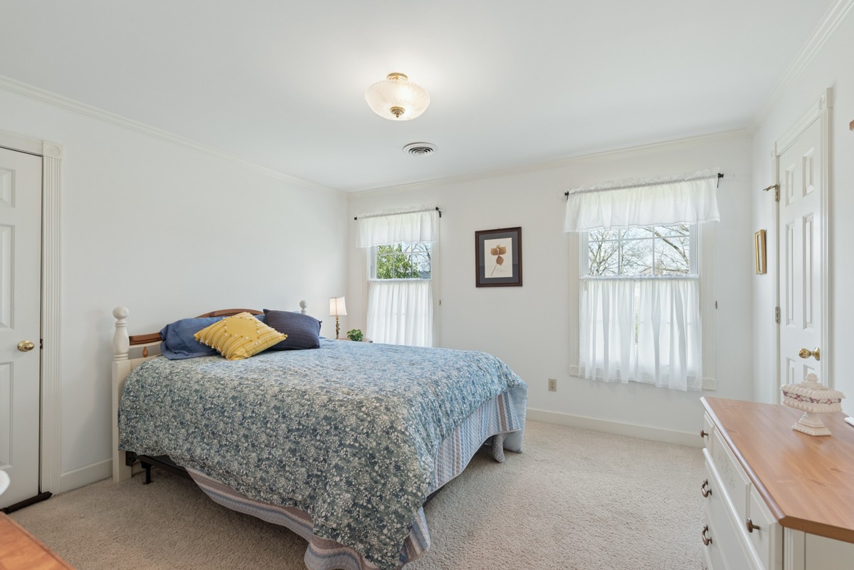 255 Lindsey Hollow Road Gallatin, TN 37066 - Photo 28 of 40 a bedroom with a bed and window