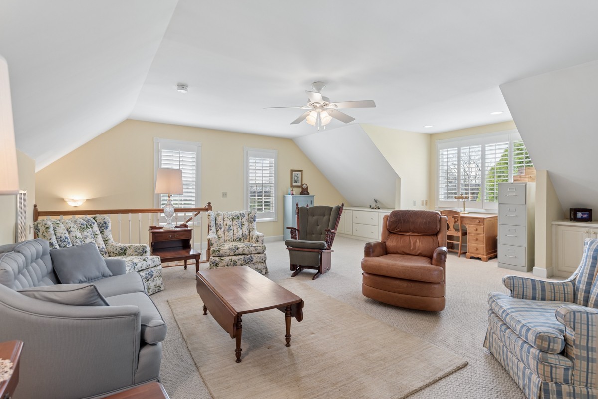 255 Lindsey Hollow Road Gallatin, TN 37066 - Photo 30 of 40 a living room with furniture and a chandelier