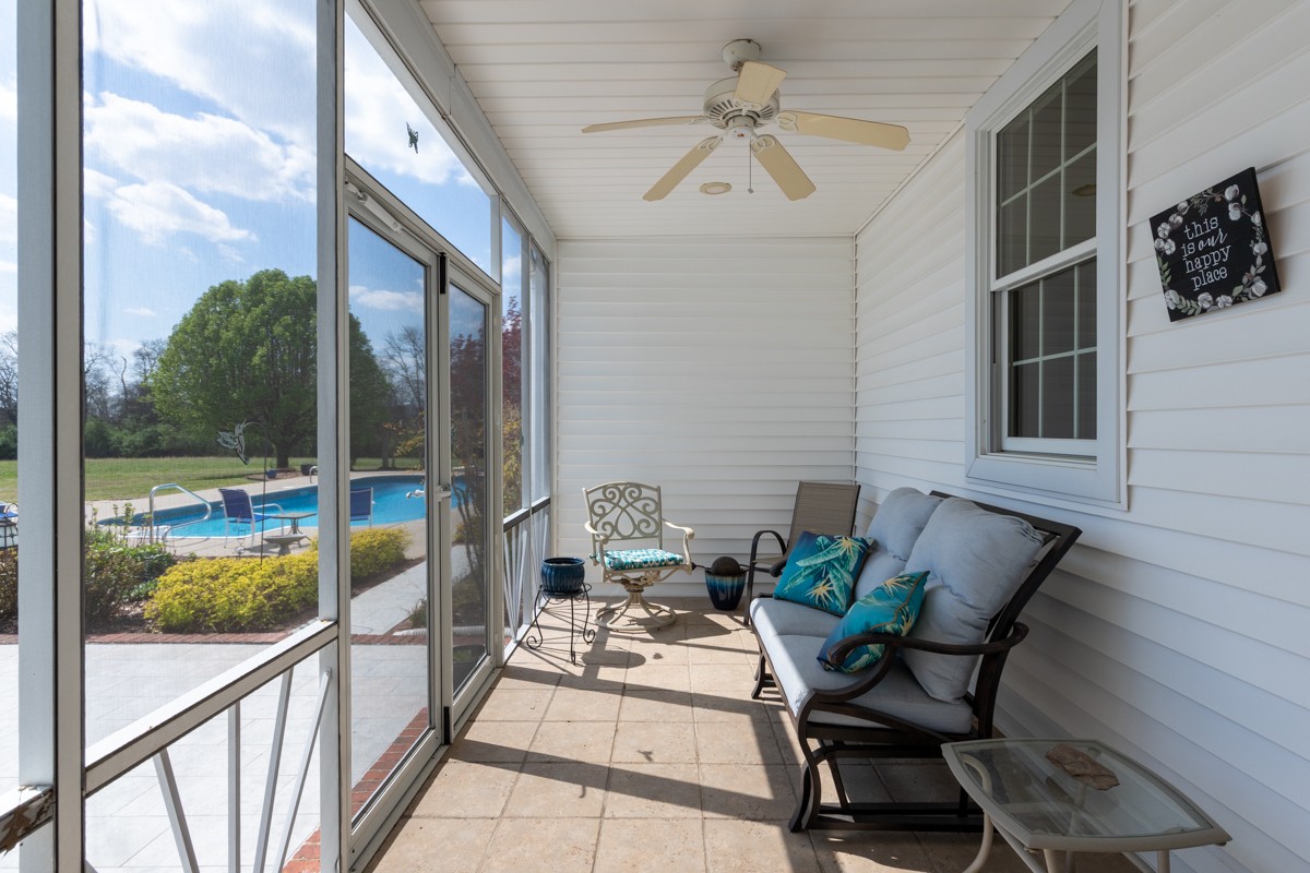 255 Lindsey Hollow Road Gallatin, TN 37066 - Photo 35 of 40 a view of a porch with furniture and a yard