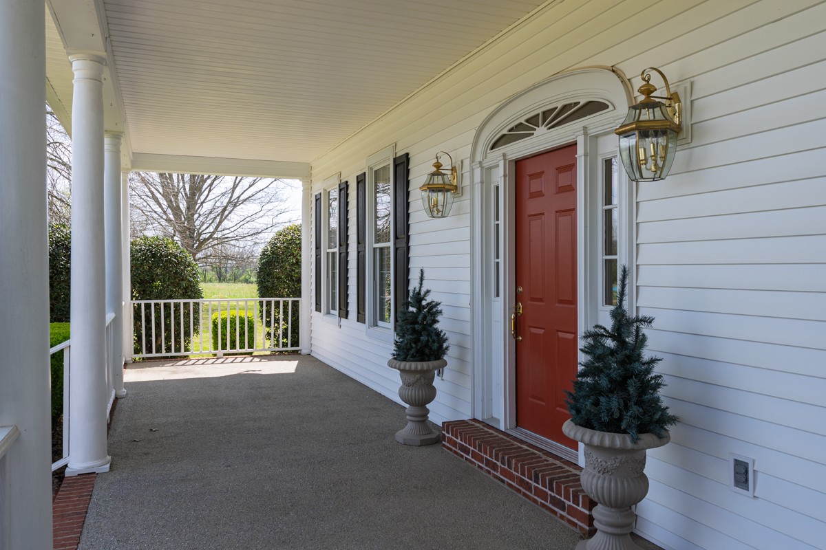 255 Lindsey Hollow Road Gallatin, TN 37066 - Photo 8 of 40 a view of a porch and garden