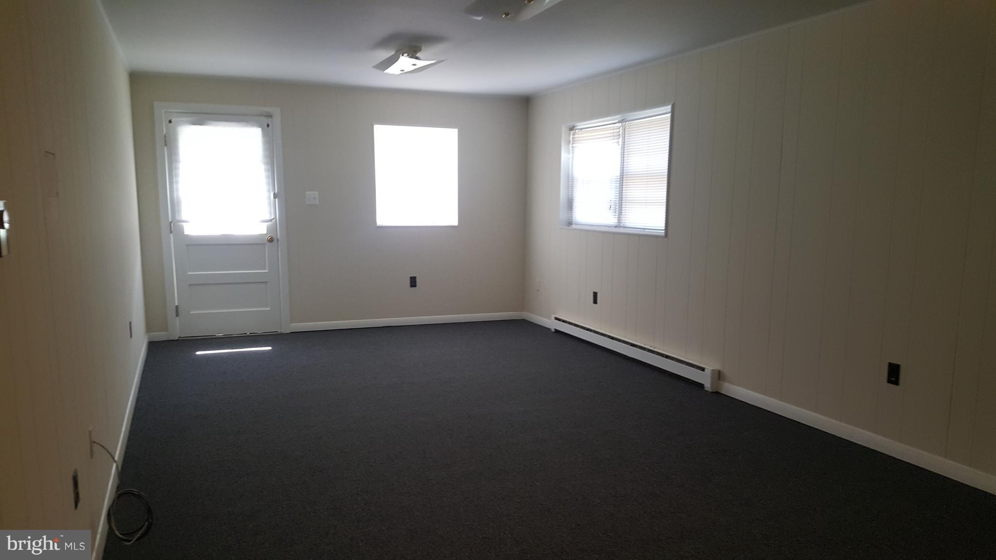 331 Londontown Road Edgewater, MD 21037 - Photo 12 of 23 an empty room with windows