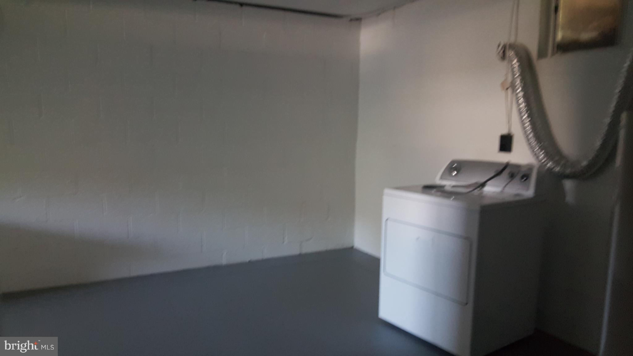 331 Londontown Road Edgewater, MD 21037 - Photo 14 of 23 a utility room with dryer and washer