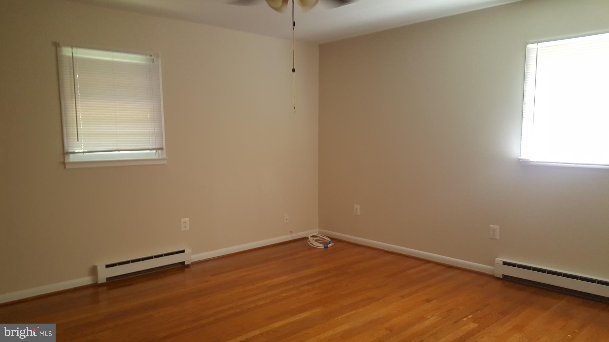 331 Londontown Road Edgewater, MD 21037 - Photo 8 of 23 an empty room with a hardwood and a window