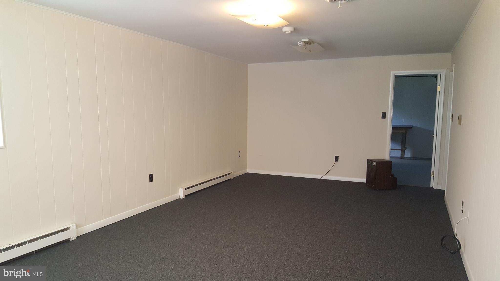 331 Londontown Road Edgewater, MD 21037 - Photo 9 of 23 an empty room with wooden floor and windows