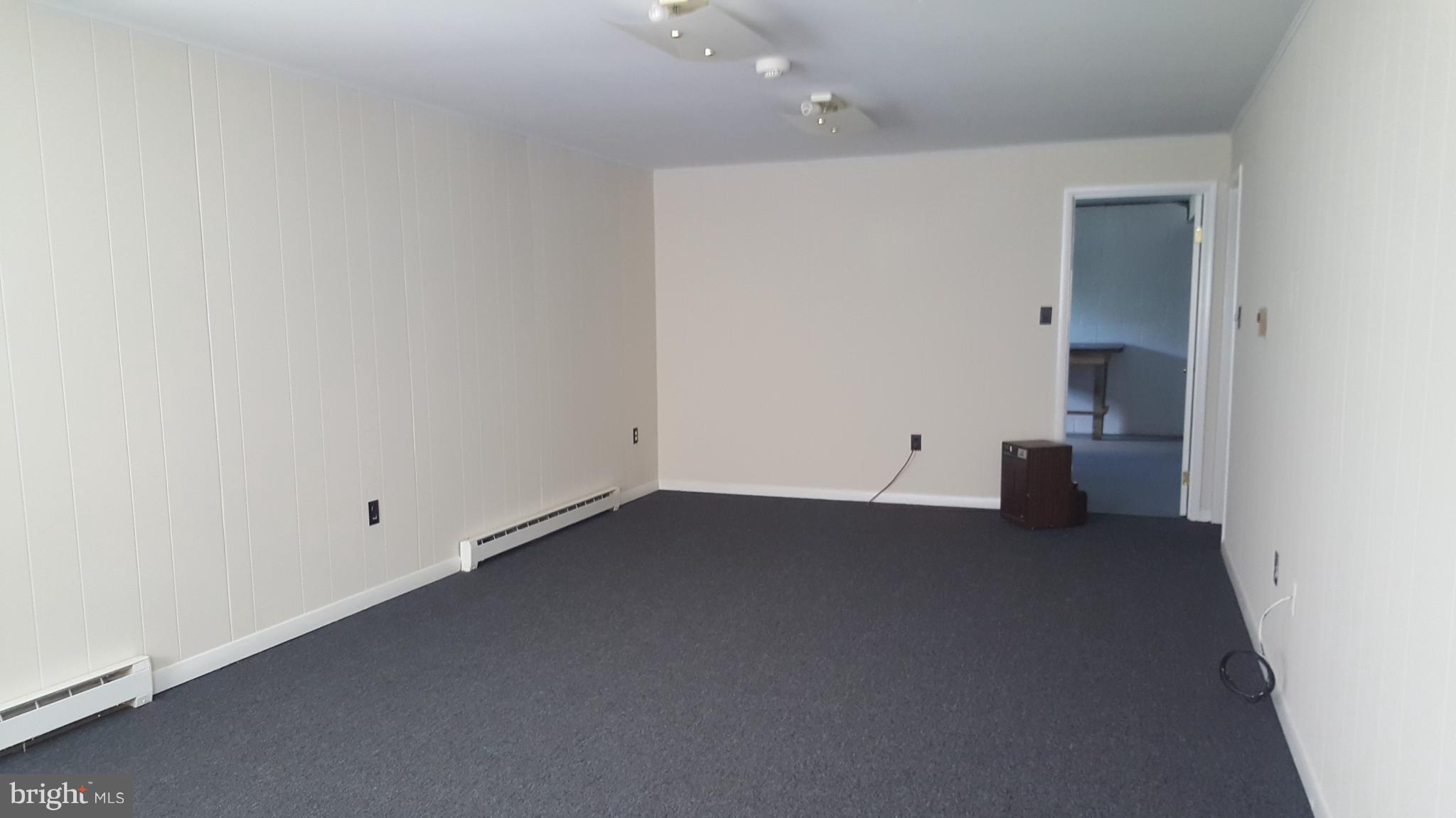 331 Londontown Road Edgewater, MD 21037 - Photo 10 of 23 a view of an empty room with a window