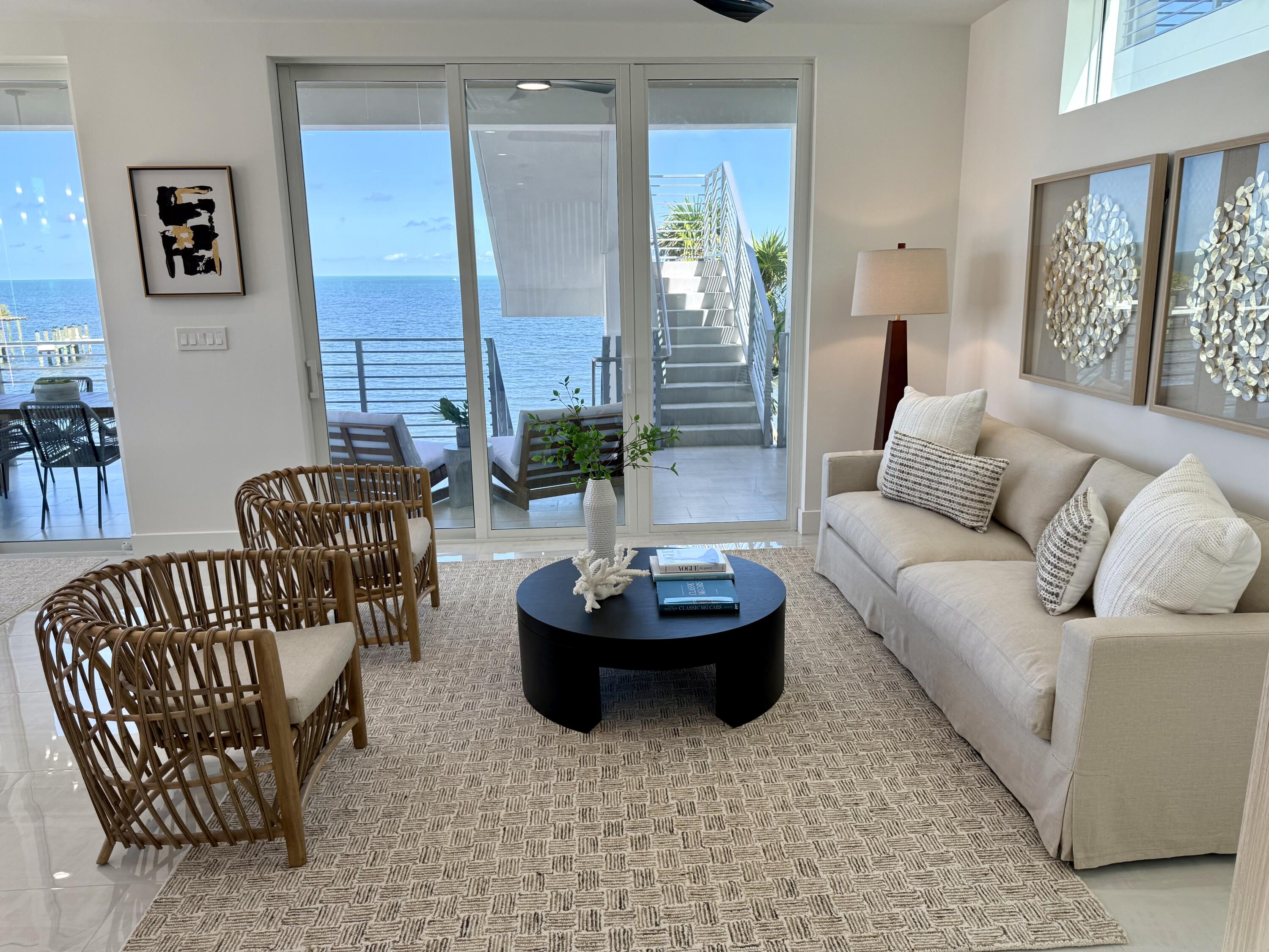 990 41st Street, Unit 10 Marathon, FL 33050 - Photo 15 of 55 a living room with furniture and a potted plant
