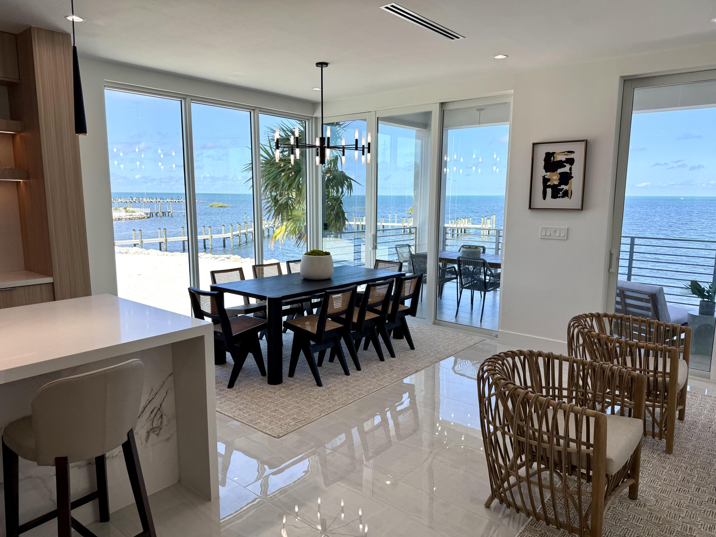 990 41st Street, Unit 10 Marathon, FL 33050 - Photo 16 of 55 a view of a dining room with furniture window and outside view