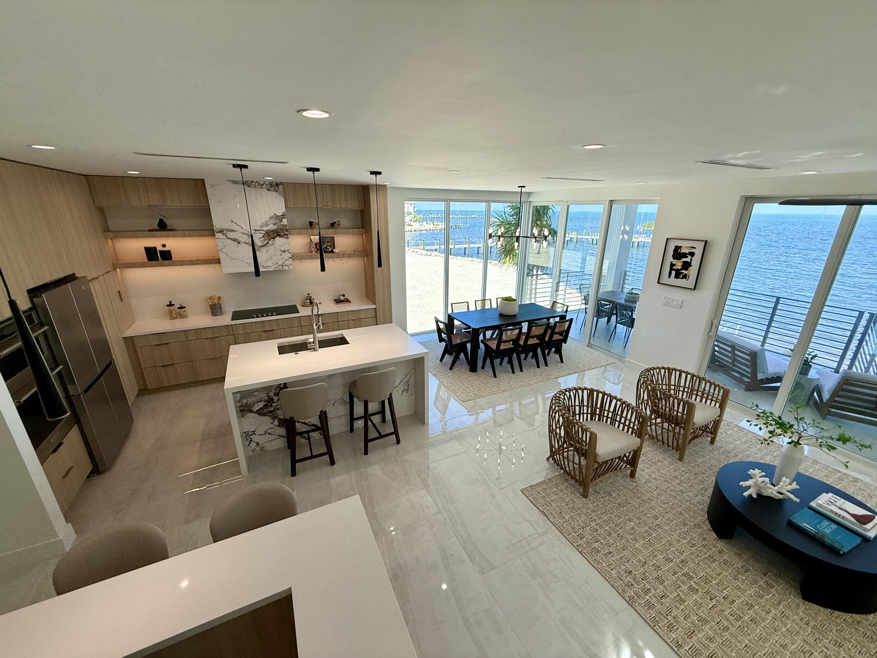 990 41st Street, Unit 10 Marathon, FL 33050 - Photo 21 of 55 a living room with furniture and a table