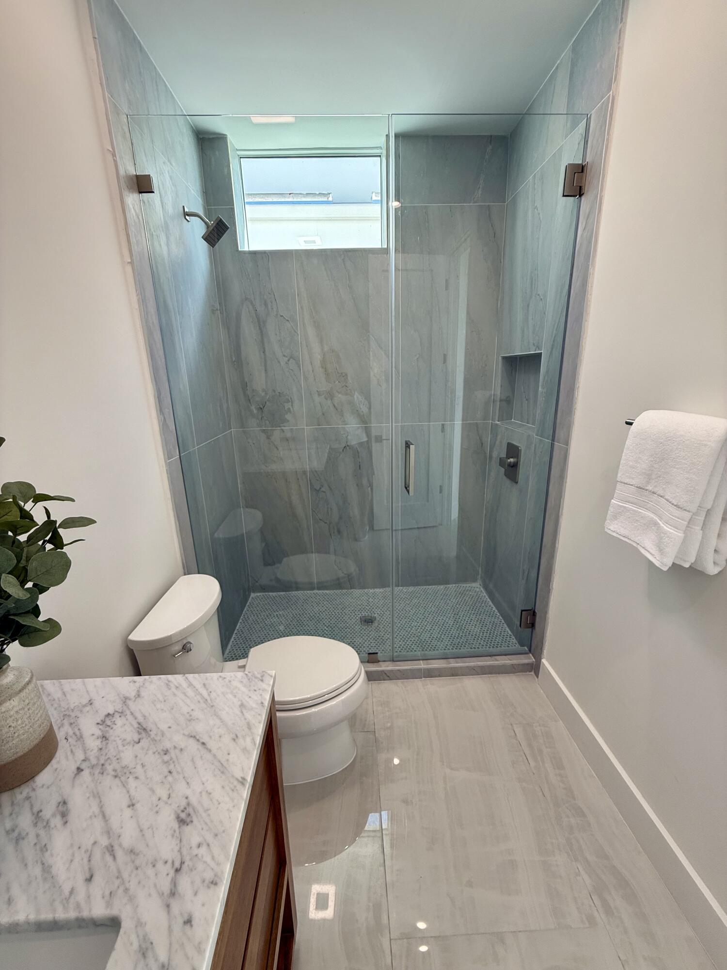 990 41st Street, Unit 10 Marathon, FL 33050 - Photo 26 of 55 a bathroom with a sink and shower