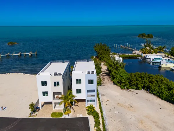 an aerial view of multiple house