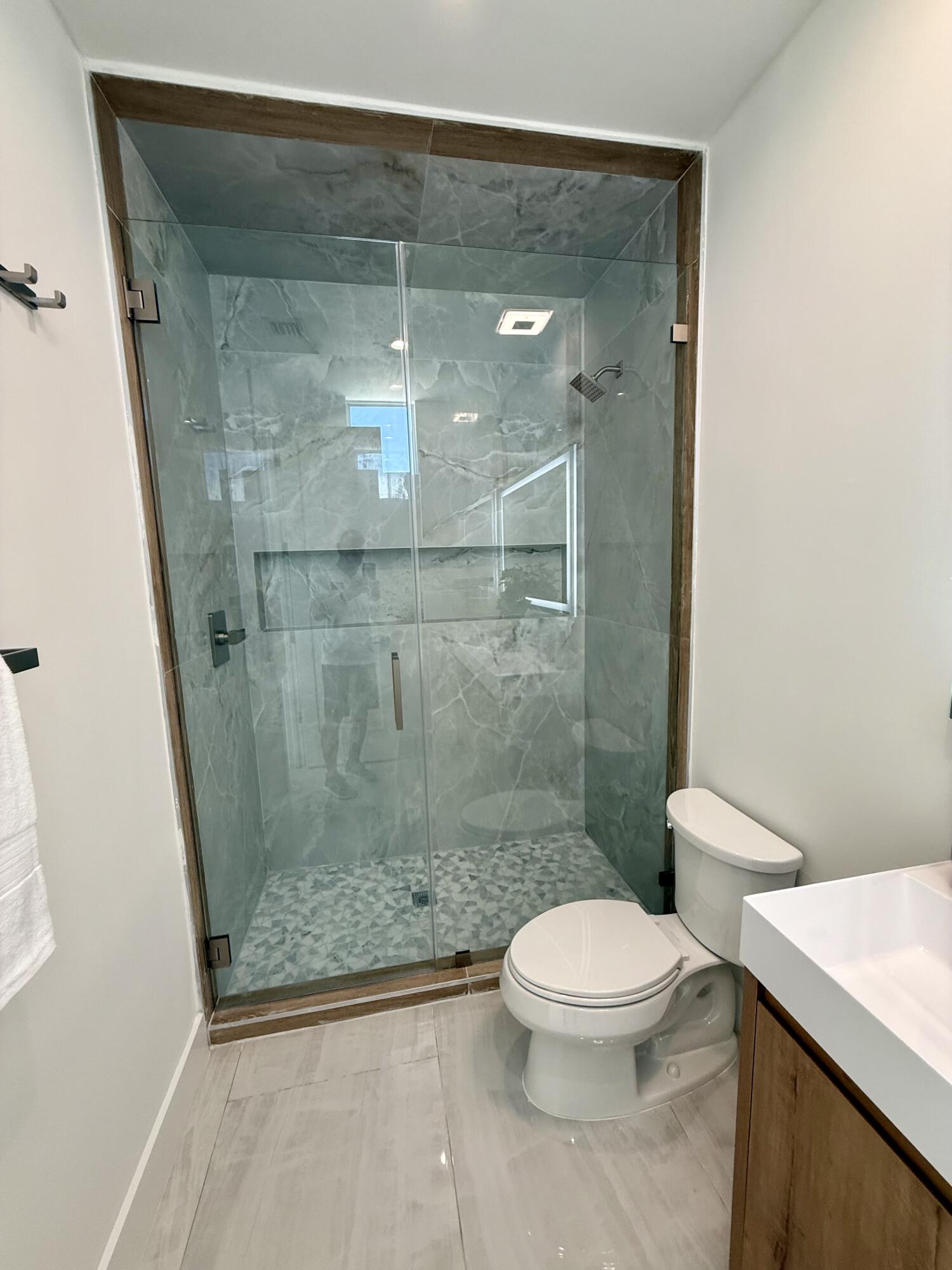 990 41st Street, Unit 10 Marathon, FL 33050 - Photo 32 of 55 a bathroom with a toilet and a shower