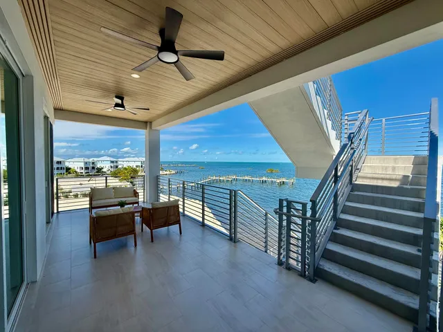 a view of a swimming pool and lounge chair