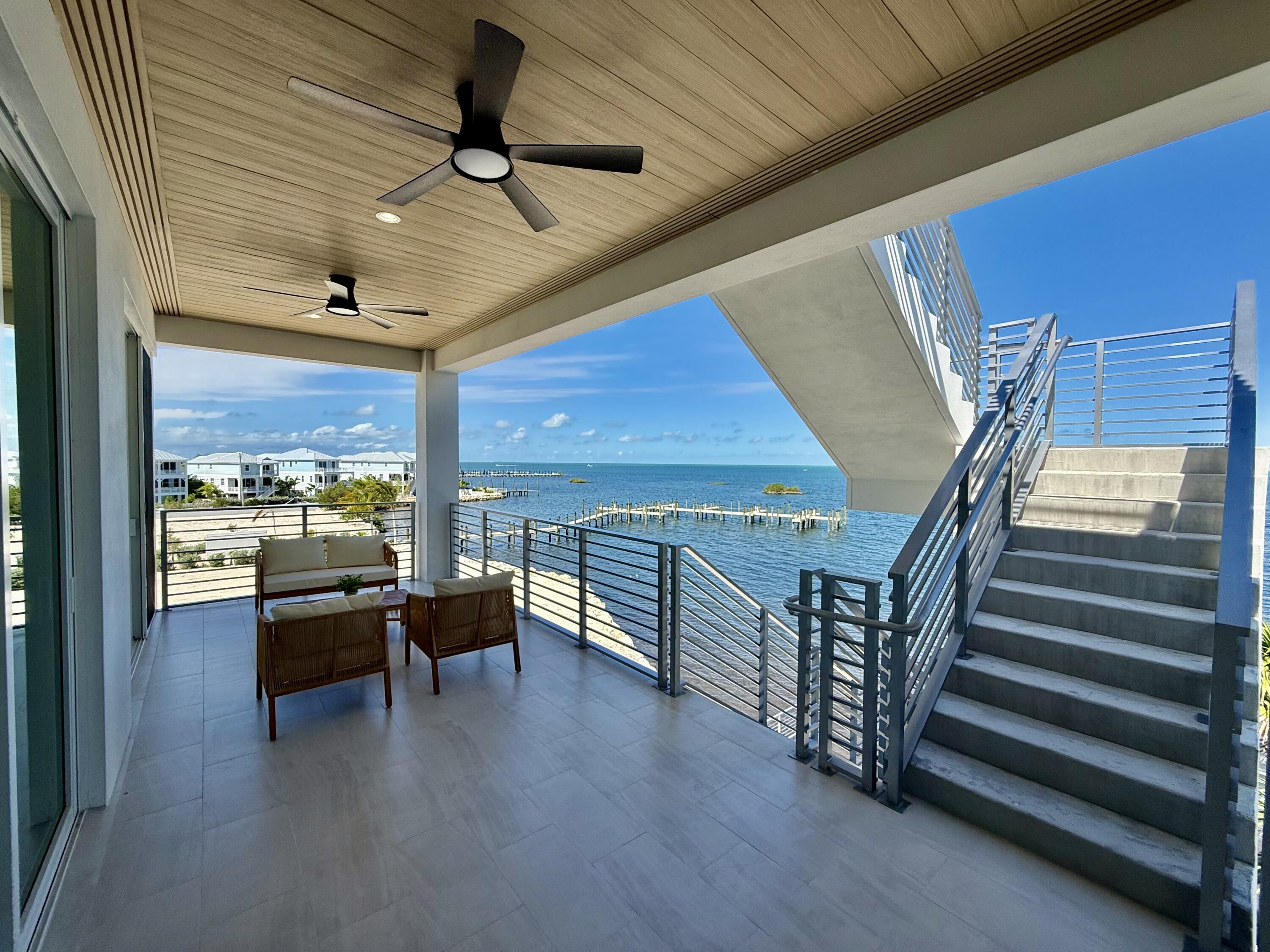 990 41st Street, Unit 10 Marathon, FL 33050 - Photo 38 of 55 a view of livingroom with furniture and staircase