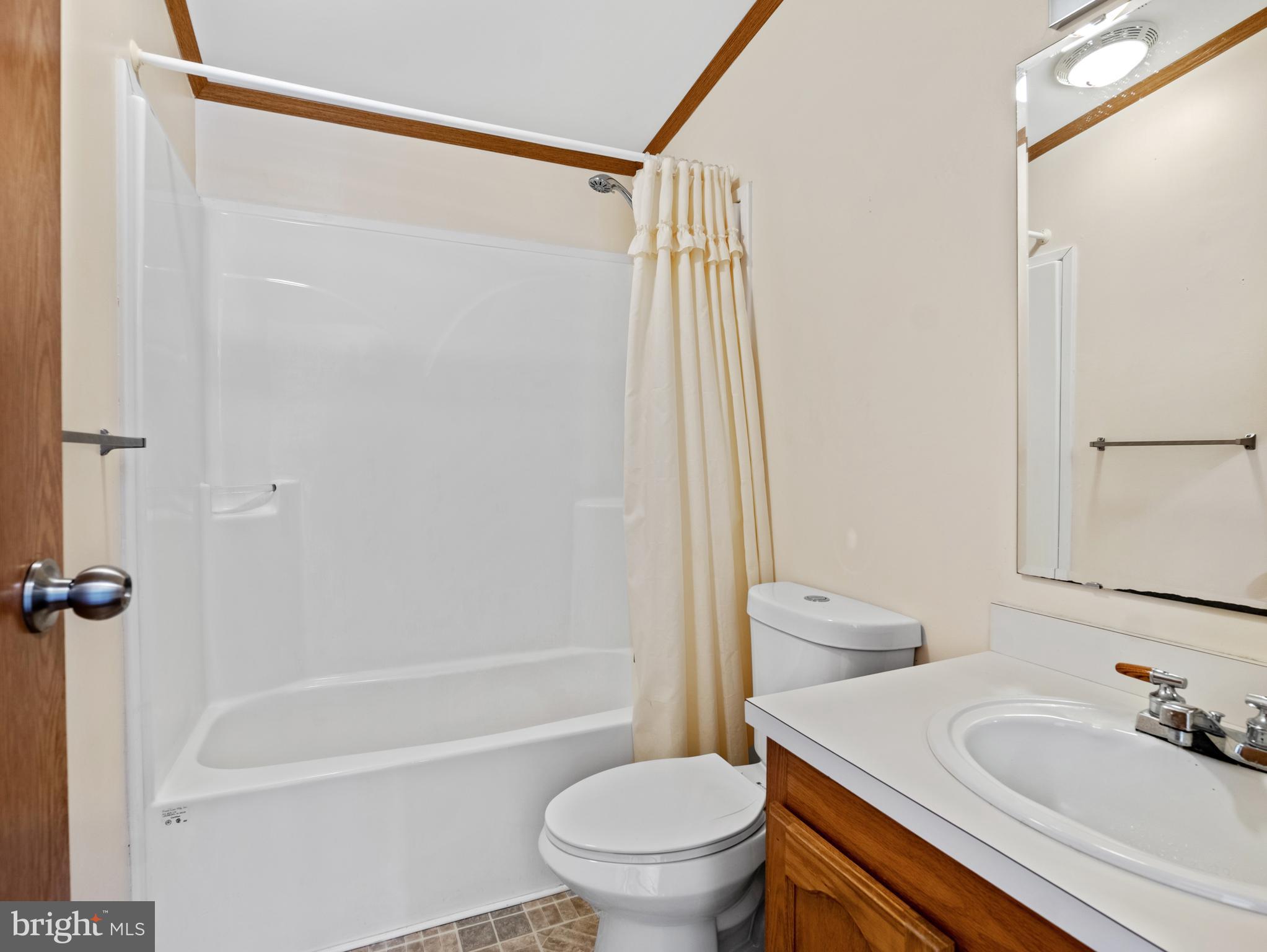 610 Audrey Drive, Unit 610 Dover, DE 19901 - Photo 16 of 27 a bathroom with a sink toilet and shower