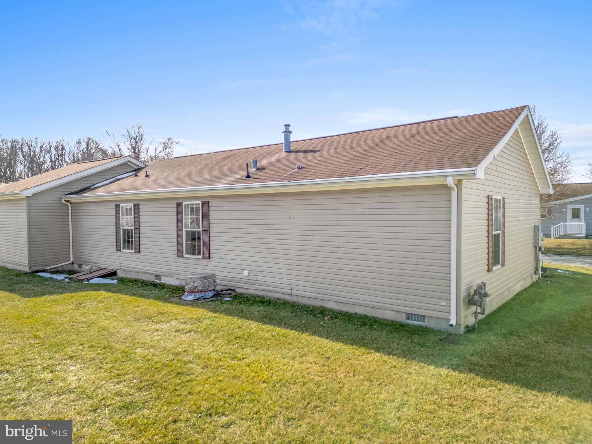 610 Audrey Drive, Unit 610 Dover, DE 19901 - Photo 25 of 27 a view of a house with a yard