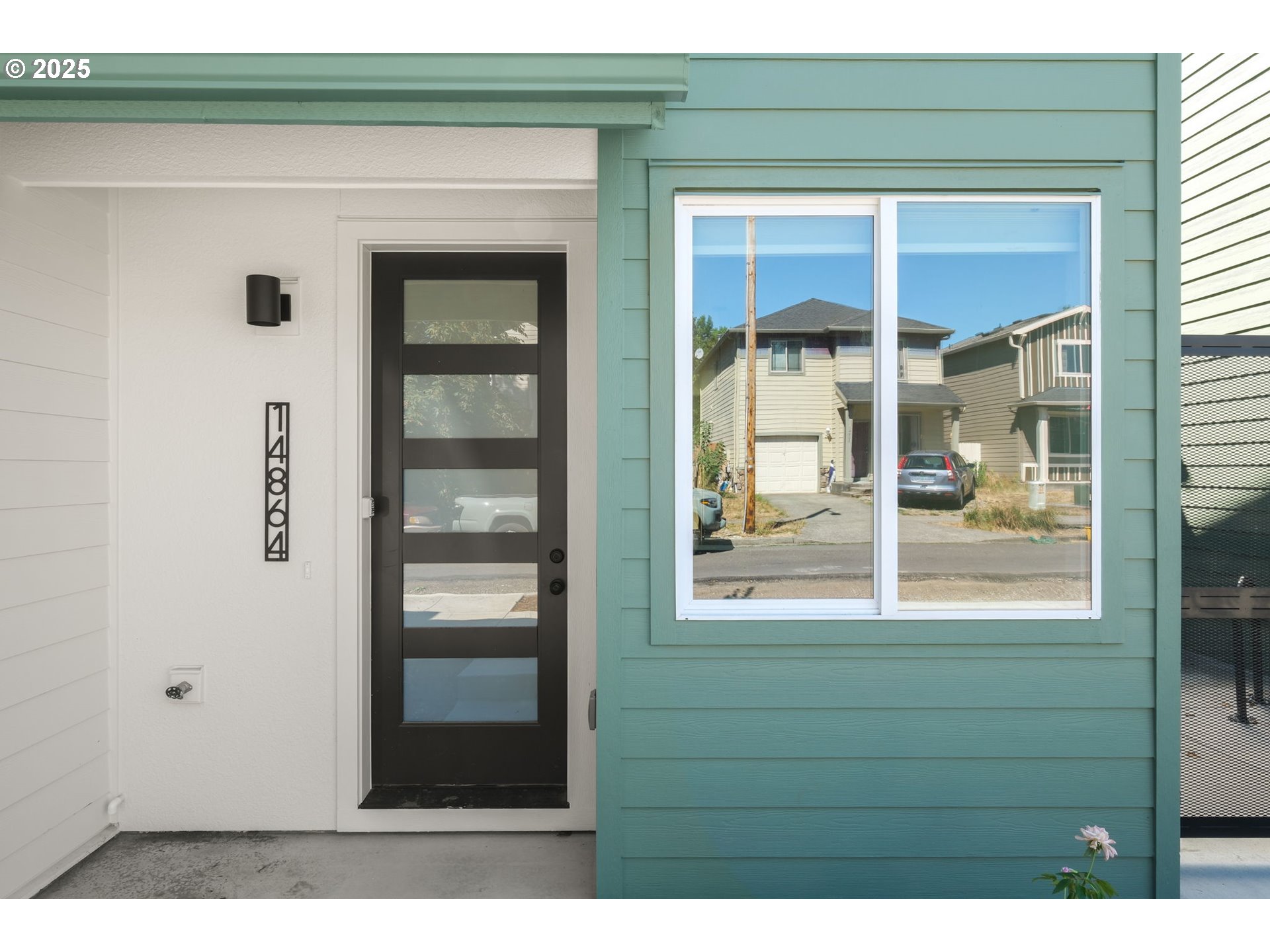 14864 Northeast Couch Street, Unit 11 Portland, OR 97230 - Photo 1 of 42 a bathroom with a window