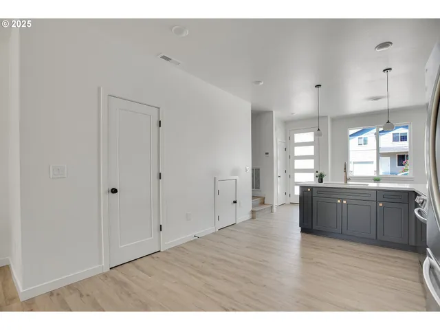 a large room with wooden floor