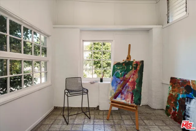 a room with furniture and a window