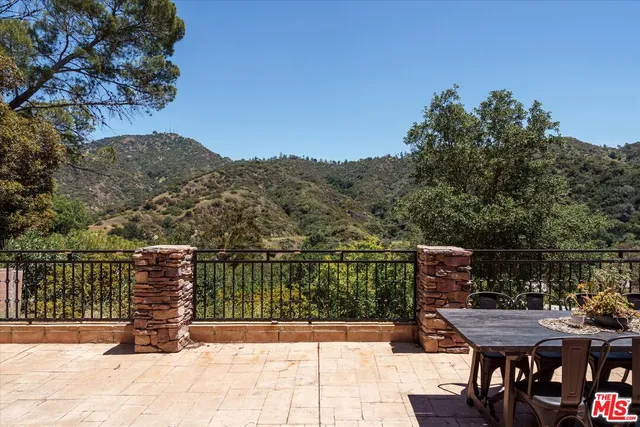 a view of a terrace with sitting area