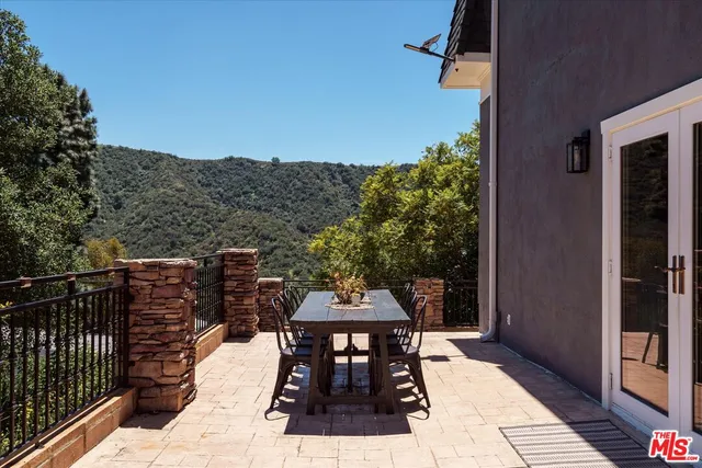 a view of a terrace with furniture