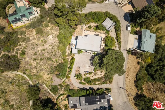 an aerial view of residential house with outdoor space