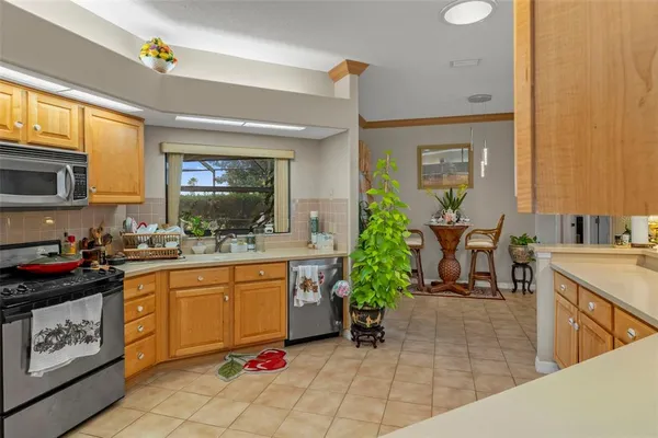 a kitchen with sink cabinets and outdoor living room