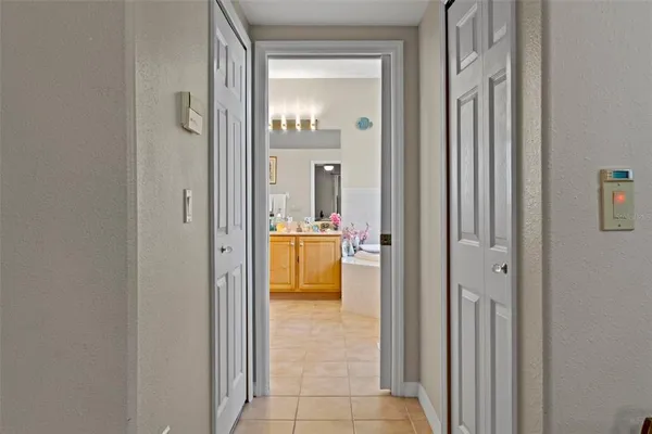 a en suite bathroom with a sink and a mirror