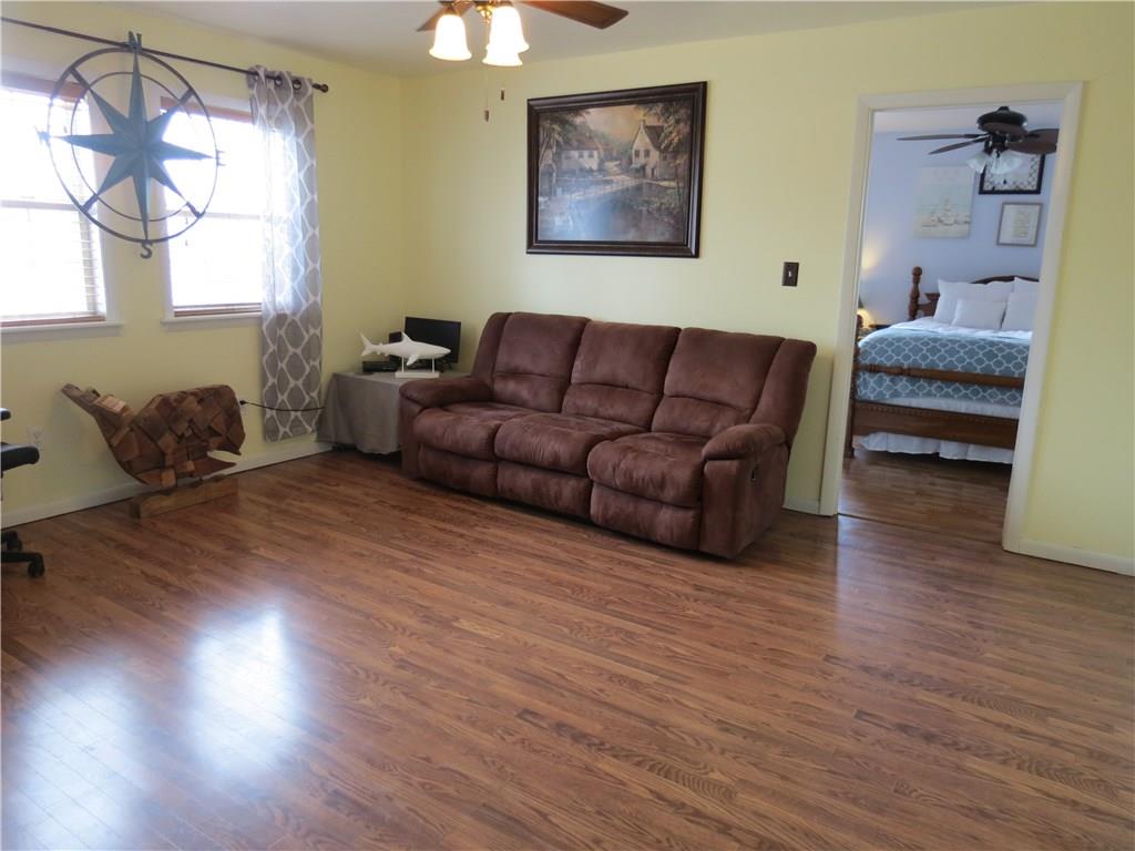 127 Alderson Road Saxonburg, PA 16056 - Photo 5 of 25 The living room is adjacent to the kitchen and has beautiful floors as does the rest of this home.