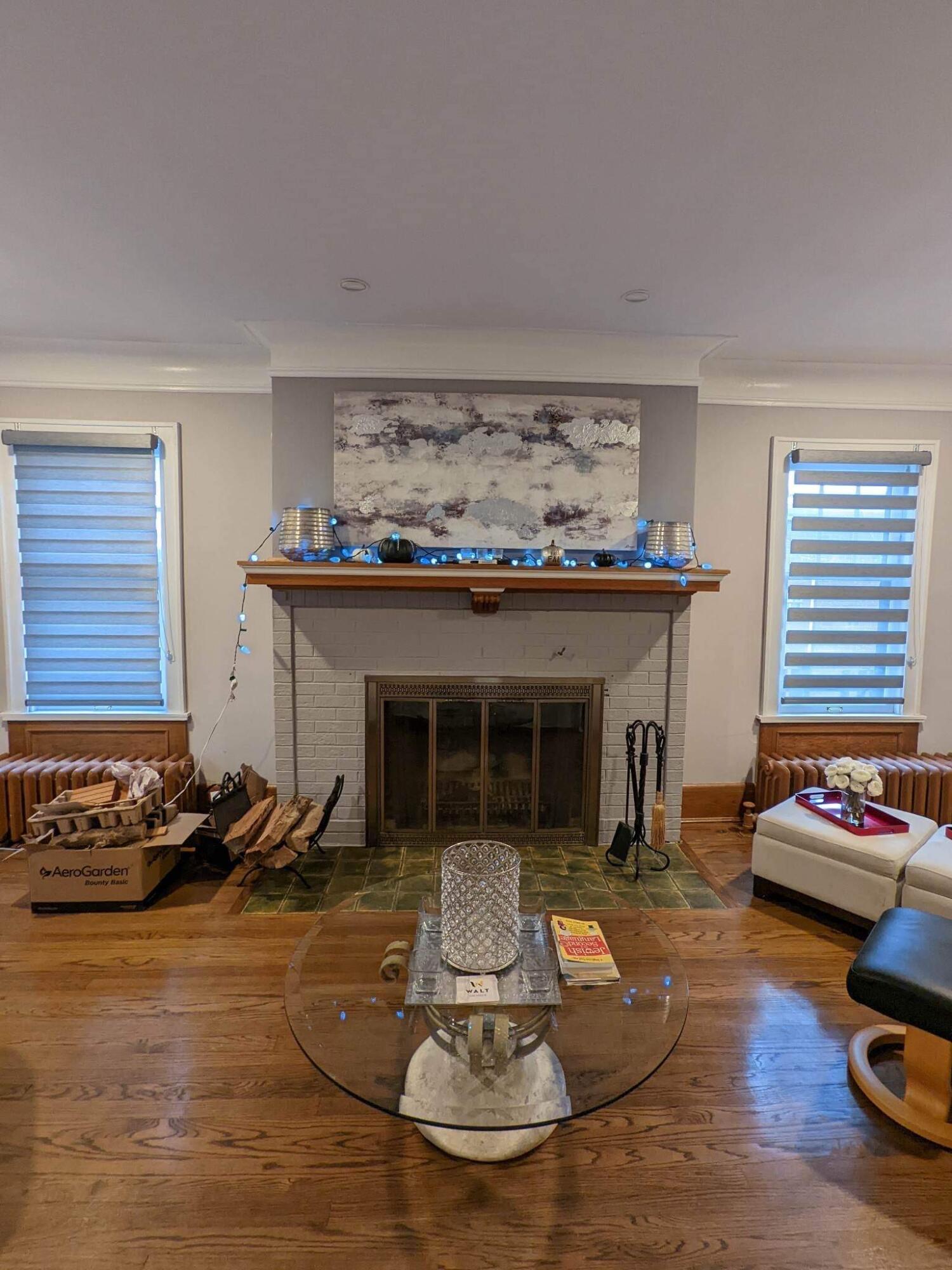 5036 West Washington Boulevard Milwaukee, WI 53208 - Photo 4 of 16 Wood Fireplace in living room. 2nd fireplace in Rec Room on lower level.