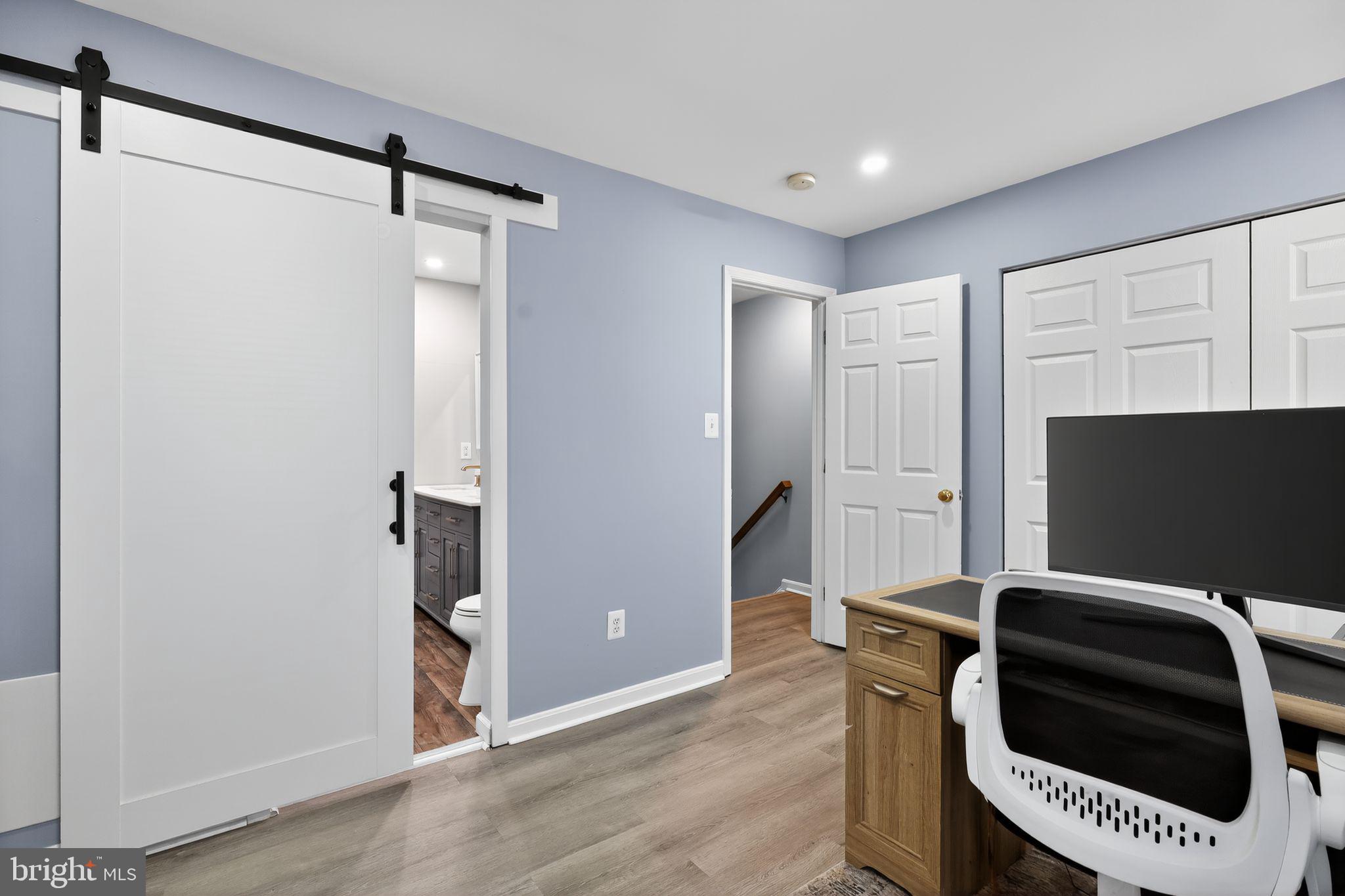 45481 Bluemont Junction Square Sterling, VA 20164 - Photo 14 of 30 a kitchen with stainless steel appliances a refrigerator and a stove top oven