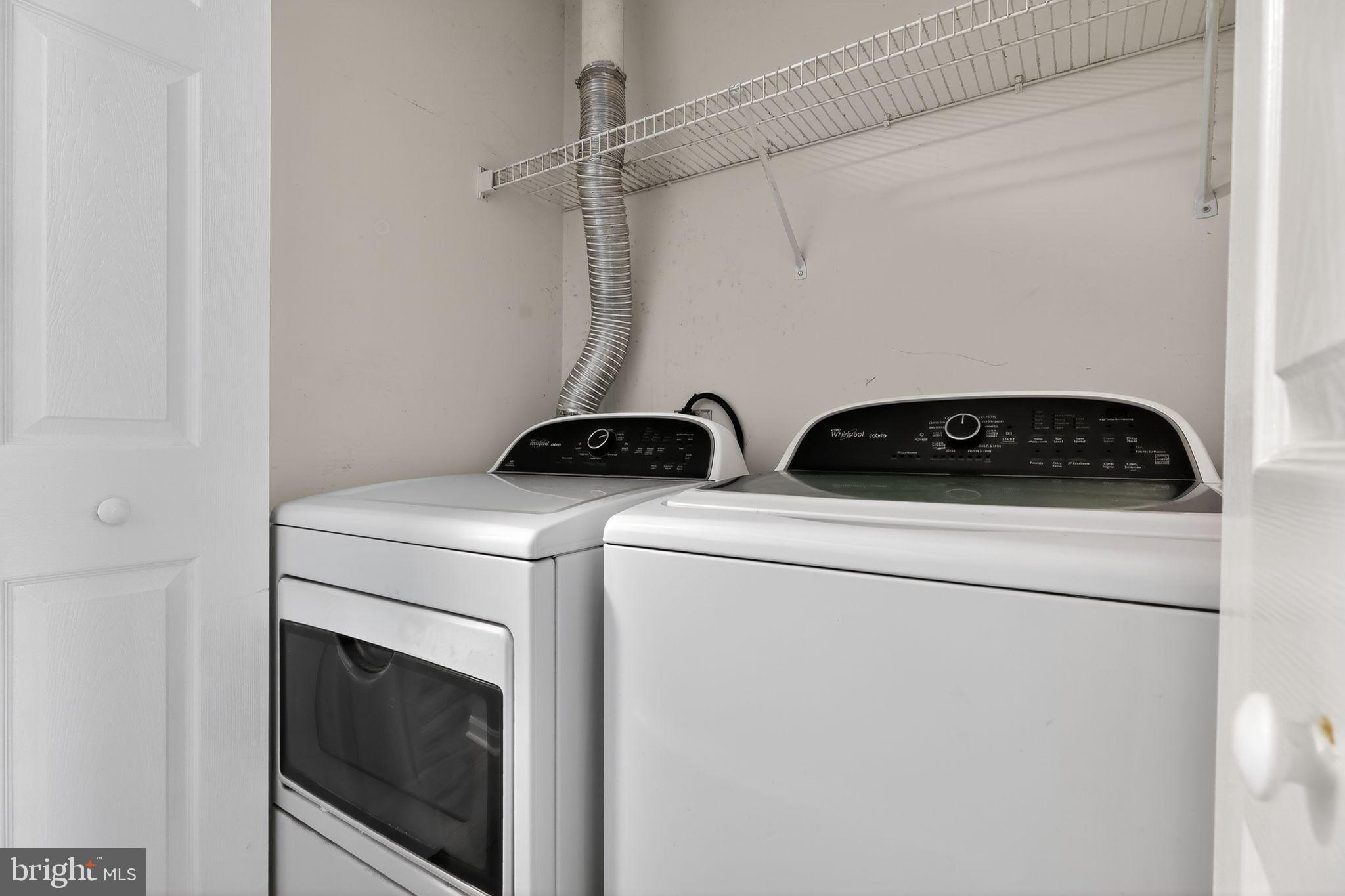 45481 Bluemont Junction Square Sterling, VA 20164 - Photo 22 of 30 a utility room with dryer and washer
