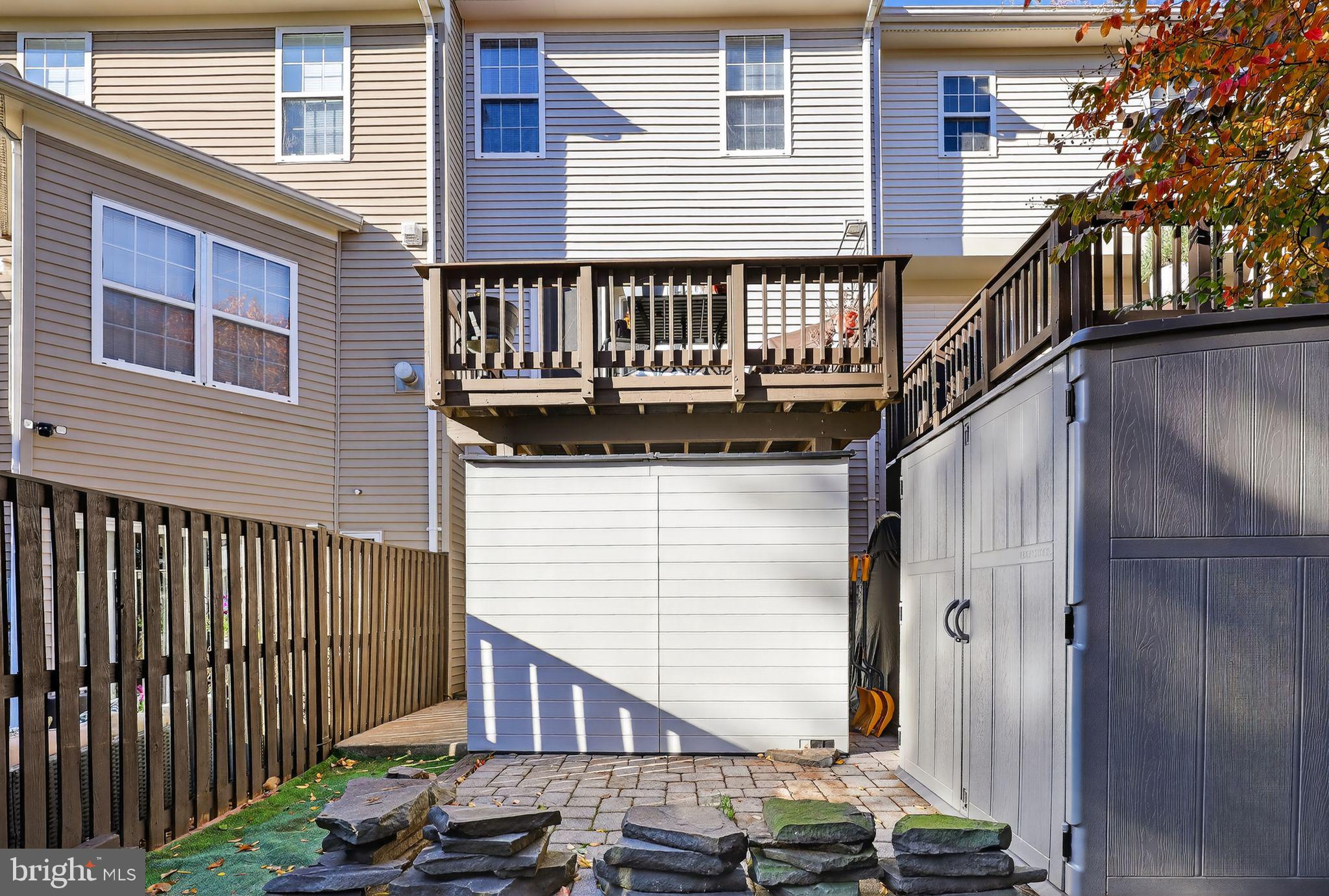 45481 Bluemont Junction Square Sterling, VA 20164 - Photo 26 of 30 a view of a house with wooden fence