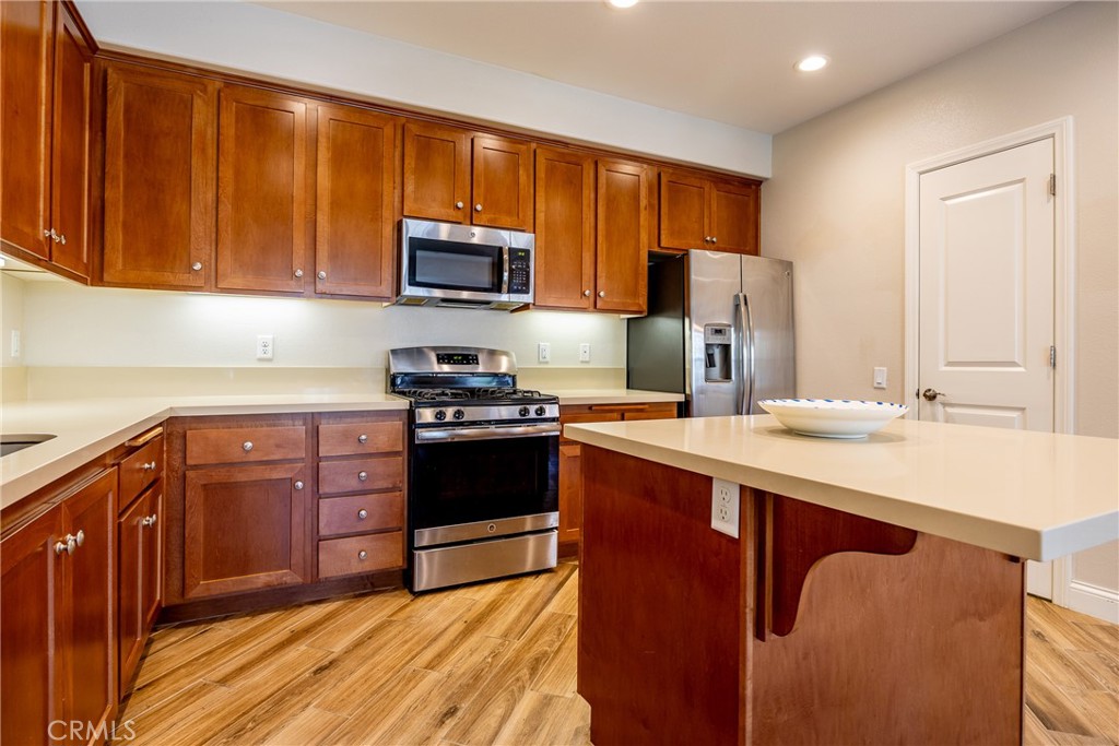 9369 Riberena Circle Atascadero, CA 93422 - Photo 20 of 48 Stainless steel appliances and recessed lights brighten the kitchen. The refrigerator stays!