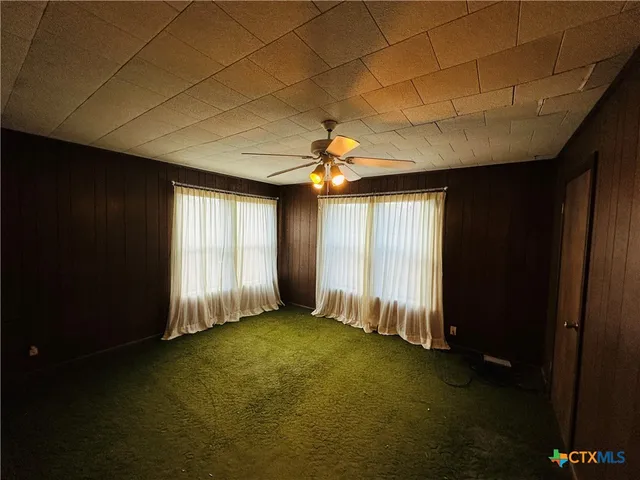 a view of a room with a window