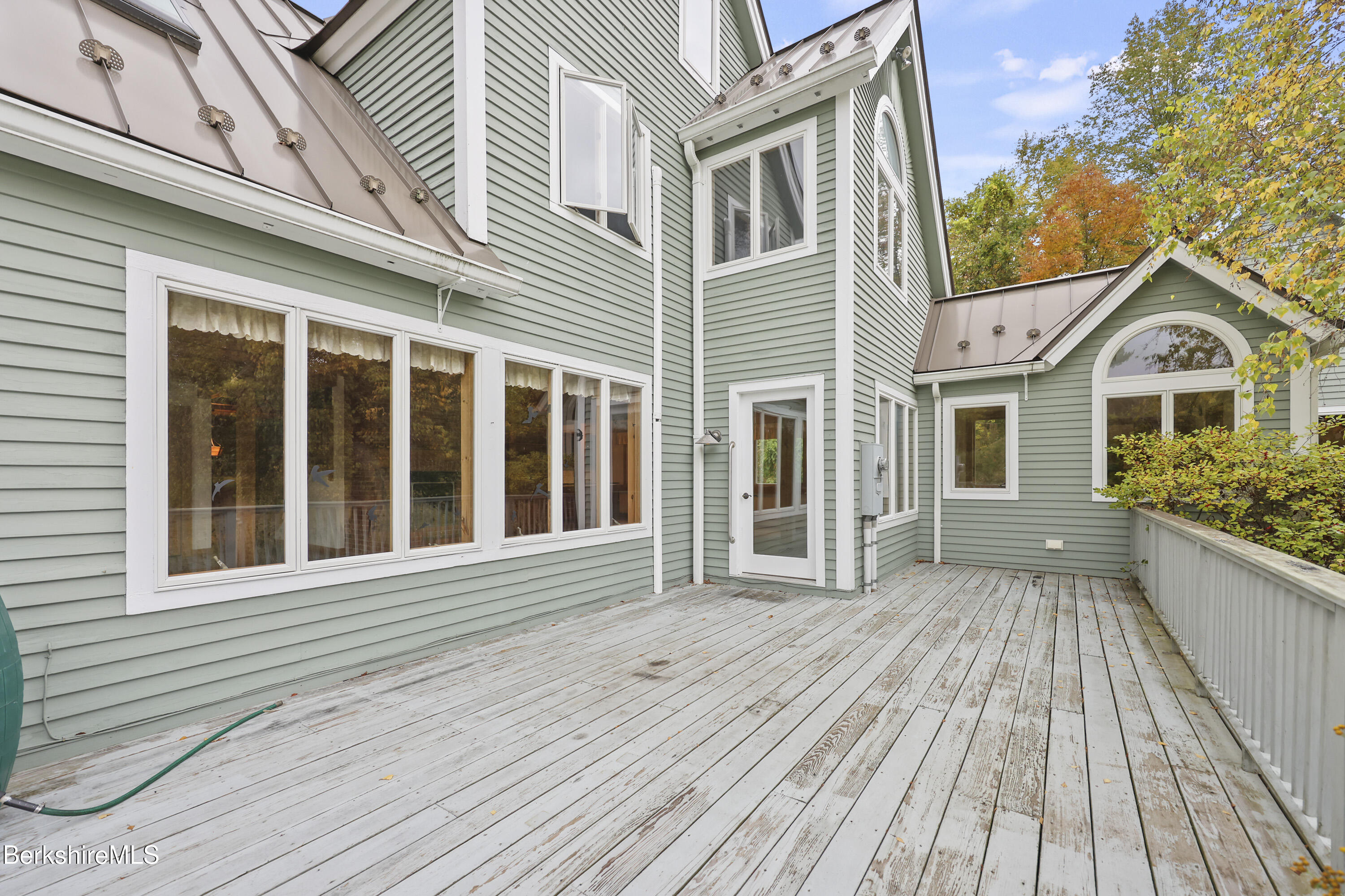 1030 Simonds Road Williamstown, MA 01267 - Photo 63 of 76 a view of a house with a wooden deck