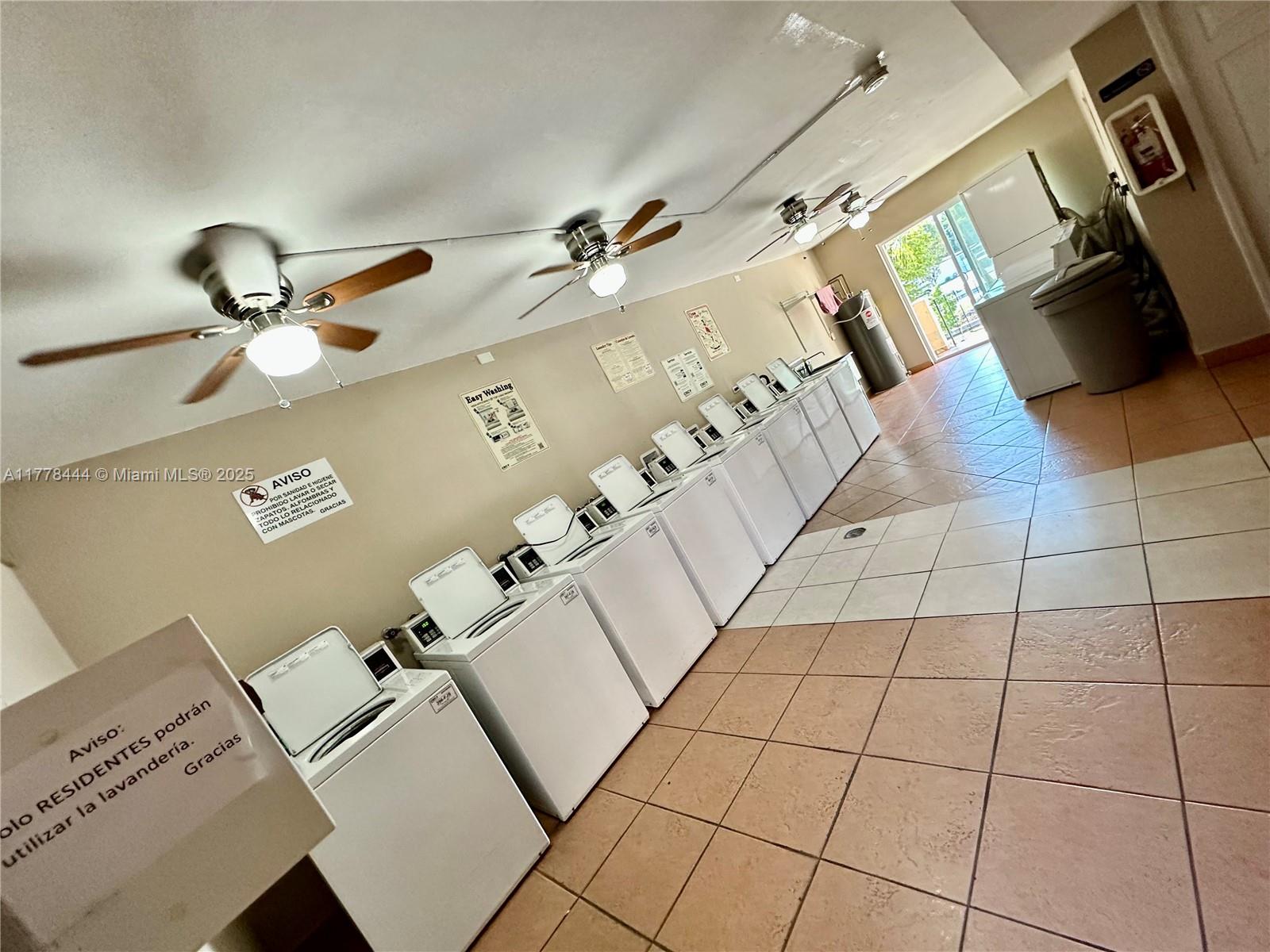 1075 West 68th Street, Unit 314 Hialeah, FL 33014 - Photo 25 of 27 a very nice looking room with a couch